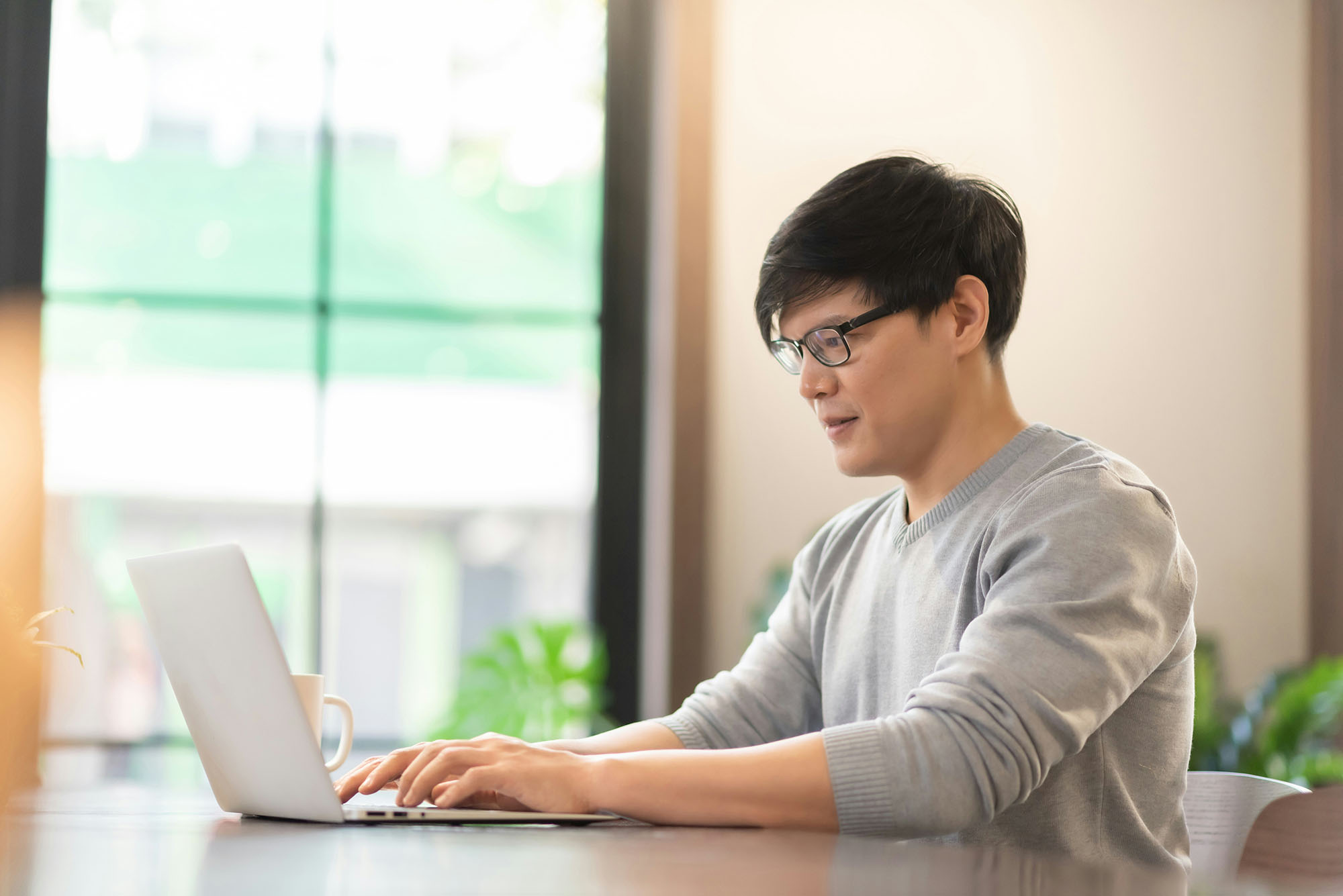 Professional using Microsoft ERP financial close software integrated with Trintech to streamline accounting tasks