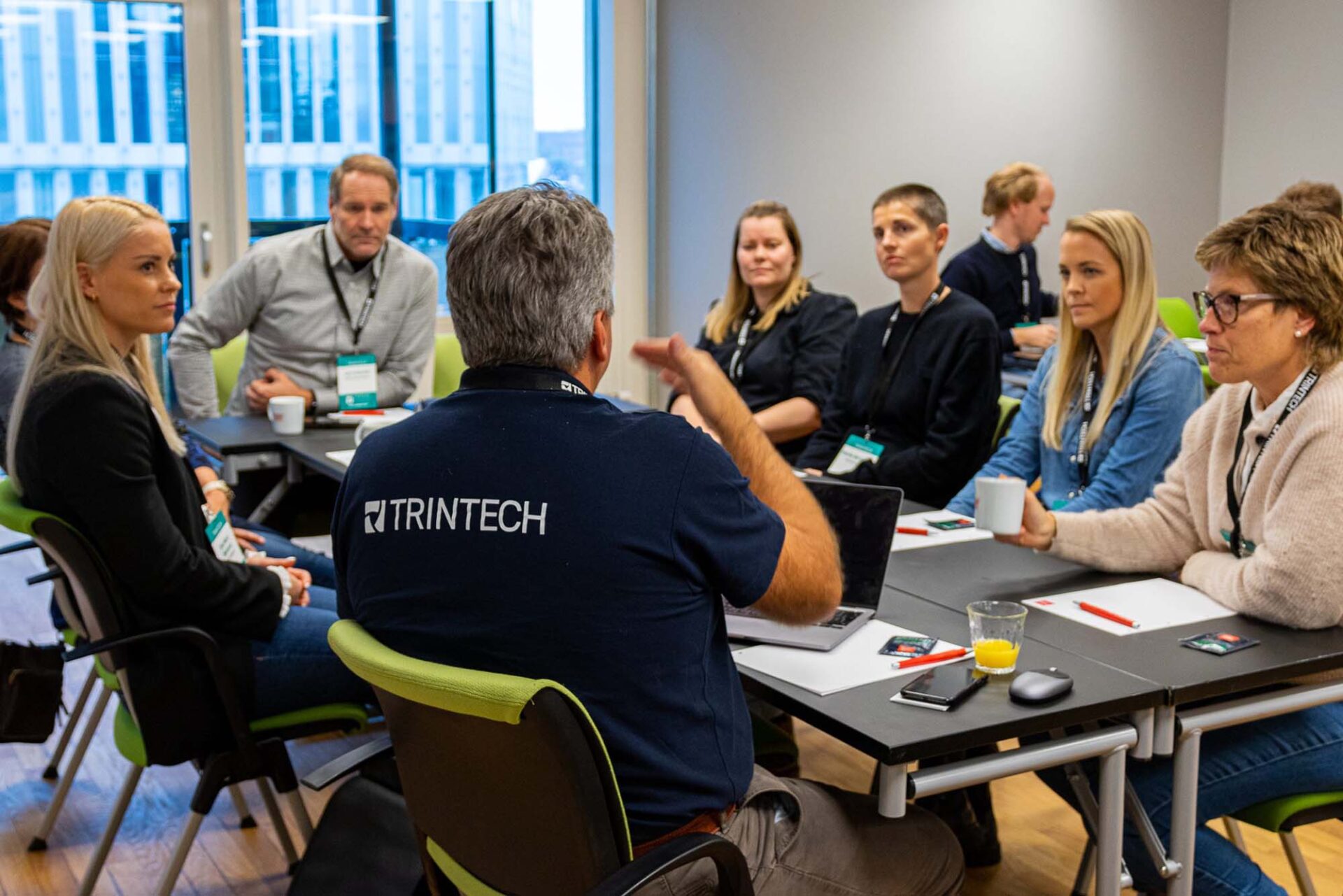Finance professionals engaging in a Trintech Customer Hub workshop to collaborate on financial close and reporting best practices